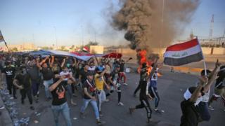 رفع حظر التجول في بغداد وارتفاع عدد قتلى الاضطرابات إلى 72